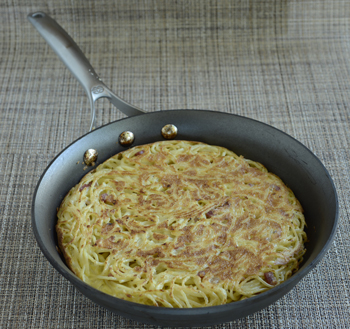 Spaghetti Frittata with Onions, Pancetta, and Parmigiano